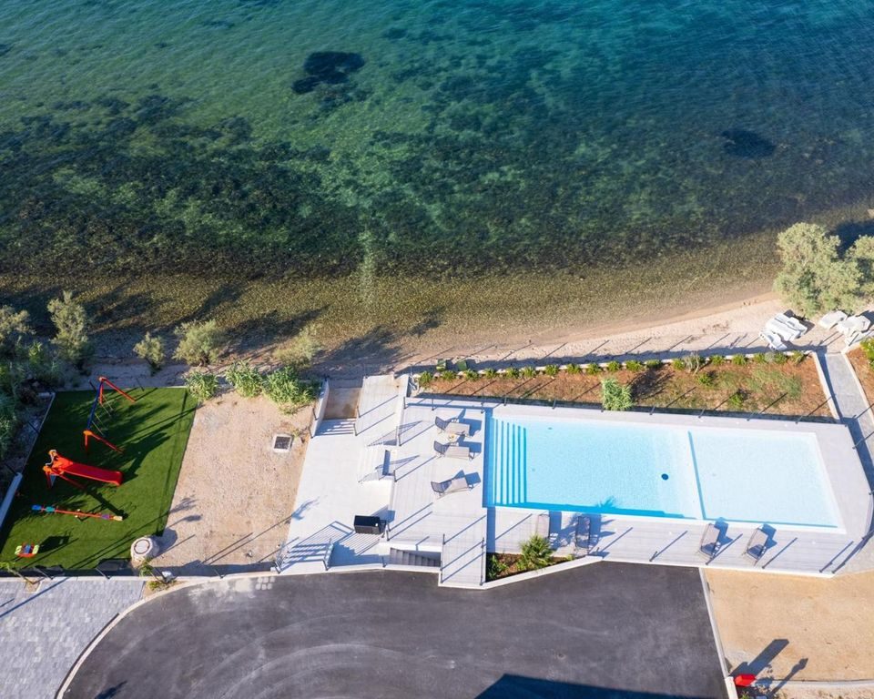 Aerial view of beachfront facilities at Camping Nevia