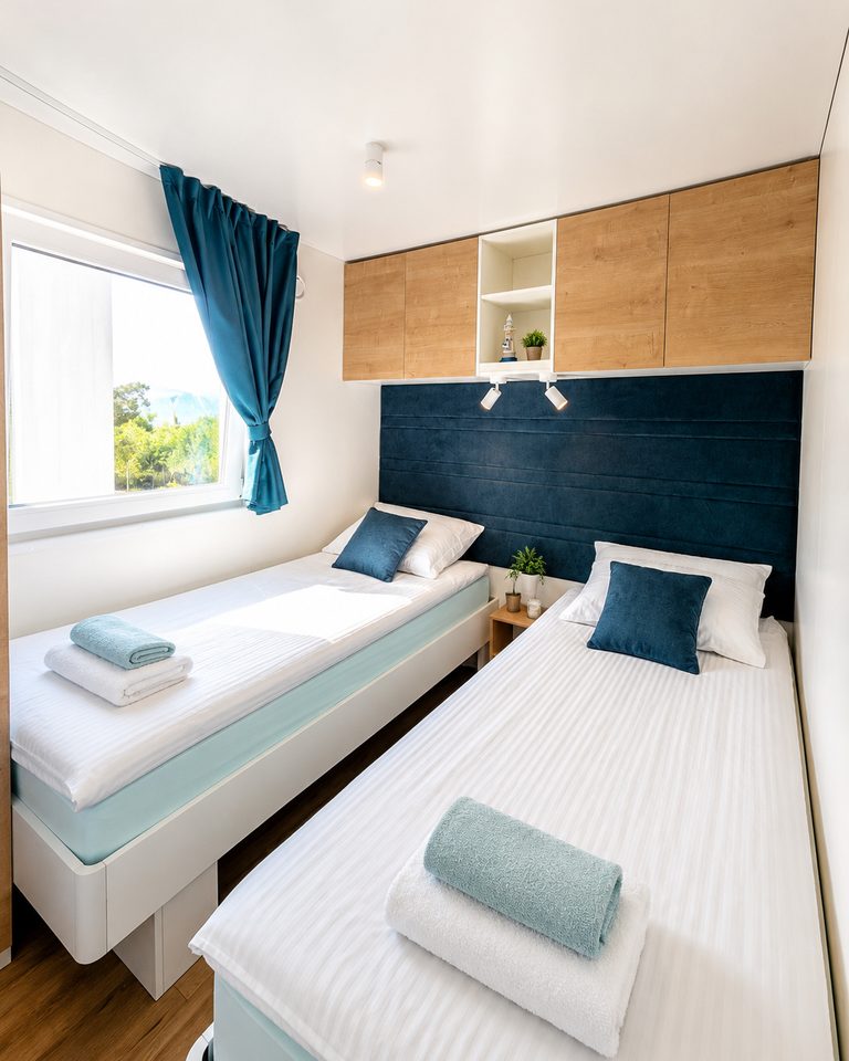 Twin bedroom with two single beds and built-in storage